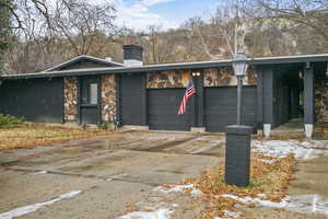 View of front facade featuring a garage