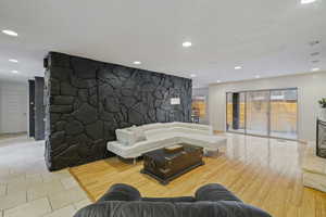 Living room featuring light tile patterned flooring