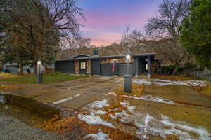 View of front of property featuring a garage