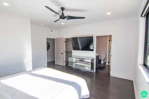 Bedroom with ensuite bathroom and ceiling fan