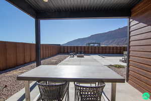 View of patio featuring a mountain view