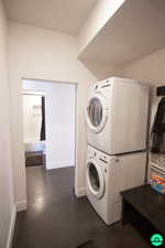 Laundry area with stacked washer / drying machine