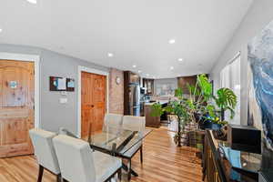 Dining room with light wood-type flooring