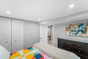 Bedroom with carpet floors and a closet