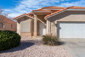 View of front of home with a garage