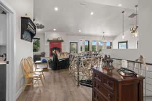 Living room with hardwood / wood-style floors