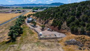 Birds eye view of property with a mountain view