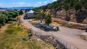 Drone / aerial view featuring a mountain view and a rural view