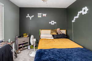 Bedroom featuring carpet floors