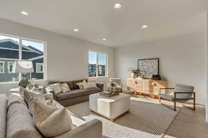 Living room with light wood-type flooring