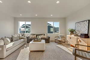 Living room featuring hardwood / wood-style flooring and plenty of natural light