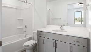 Full bathroom with vanity, toilet, and bathing tub / shower combination