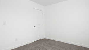 Spare room with carpet flooring