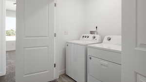 Laundry area featuring washing machine and dryer