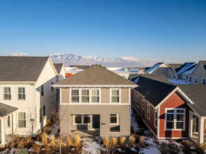 Rear view of property featuring a mountain view