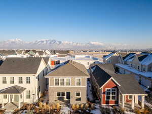 Birds eye view of property with a mountain view