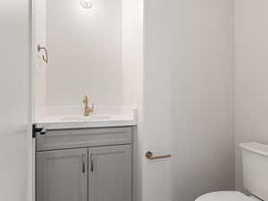 Bathroom with vanity and toilet