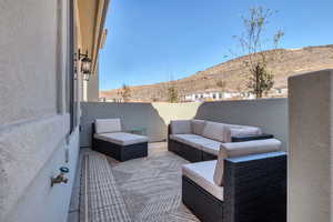 View of patio / terrace with a mountain view