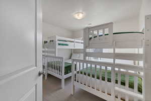 Bedroom featuring carpet floors