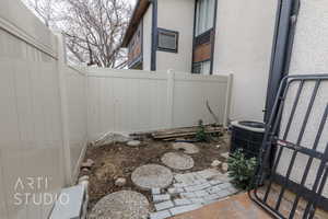 View of patio featuring central AC unit