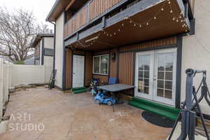 View of patio / terrace featuring french doors and a balcony