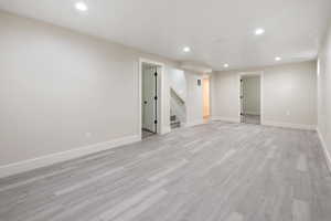 Empty room with light wood-type flooring