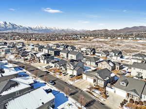 Snowy aerial view with a mountain view