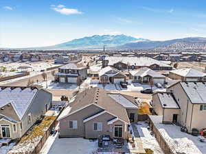 Snowy aerial view with a mountain view