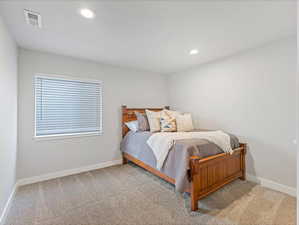 View of carpeted bedroom