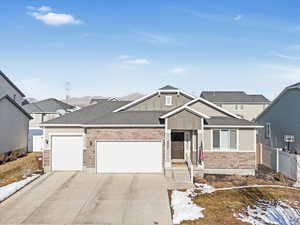 View of front of home with a garage