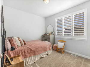 Bedroom with carpet