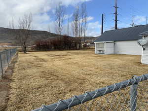 View of yard with a mountain view