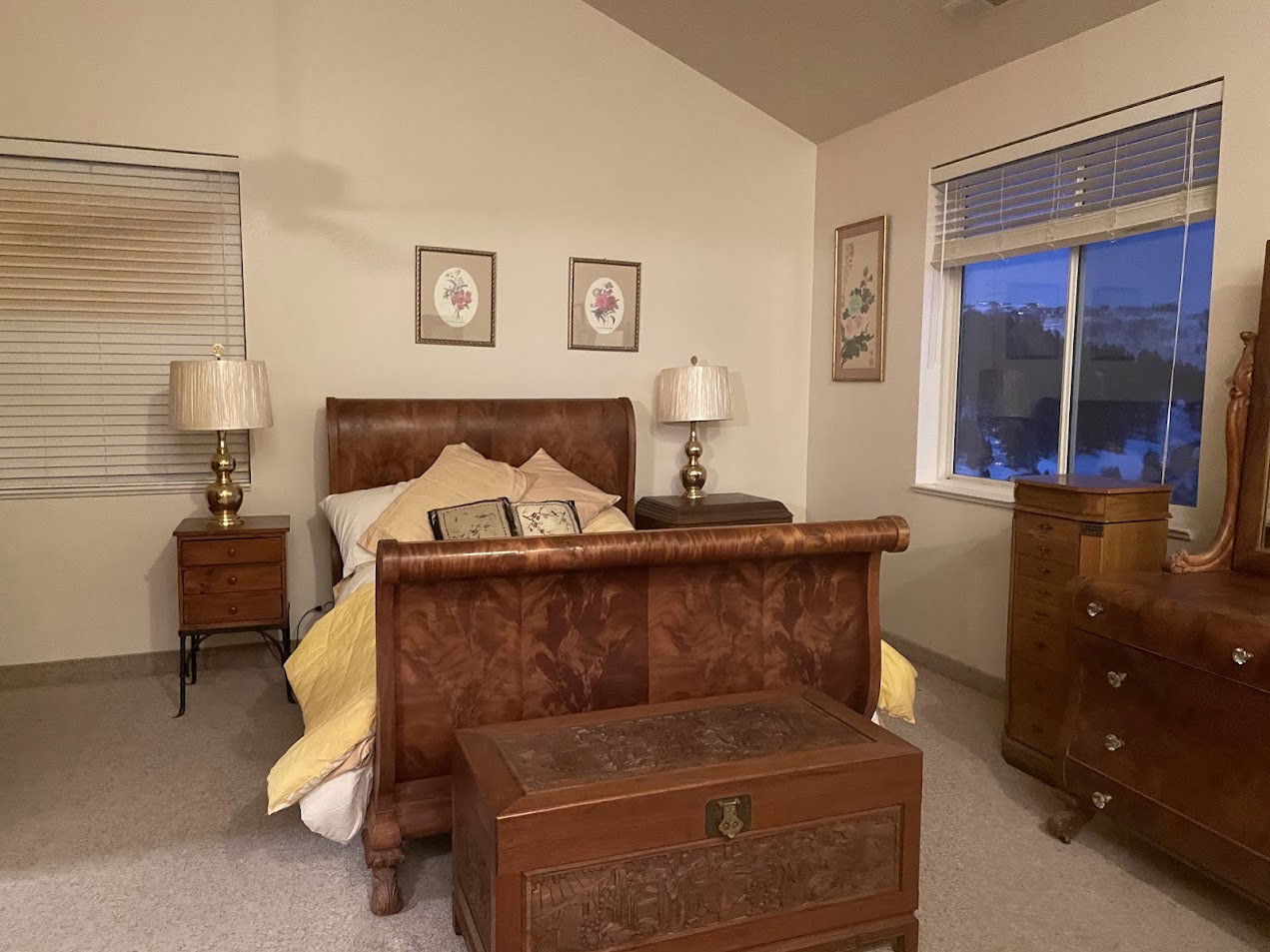 Primary Bedroom with vaulted with a fireplace and a covered deck