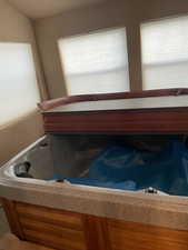 enclosed hot tub room--hot tub needs work.   This is an enclosed porch that was added.