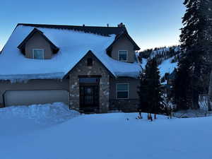 View of front of home featuring a garage