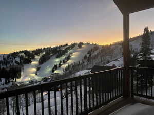 covered deck on back of property featuring a mountain view this is the sundown lift