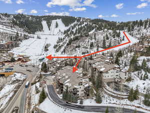 Snowy aerial view with a mountain view