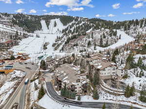 Snowy aerial view with a mountain view