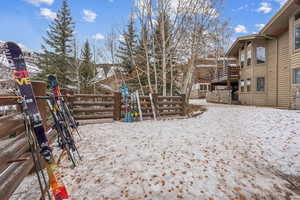 Snowy yard with a mountain view