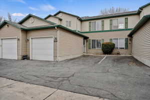 View of front facade featuring a garage