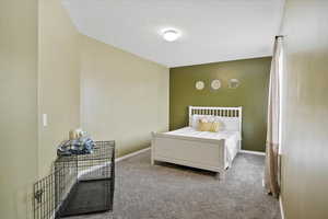 Bedroom featuring carpet floors