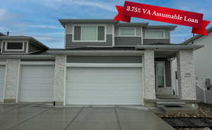 View of front facade with a garage