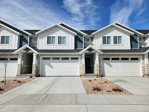 Craftsman-style home featuring a garage