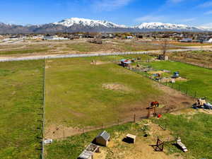 Birds eye view of property featuring a mountain view and a rural view