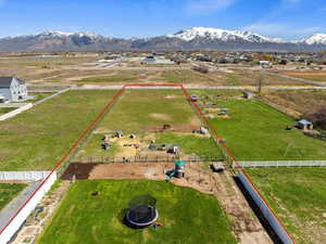 Drone / aerial view featuring a mountain view and a rural view