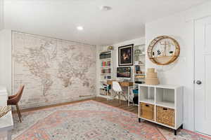 Office space featuring hardwood / wood-style flooring