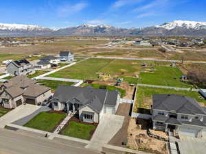 Birds eye view of property with a mountain view