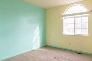 View of carpeted spare room