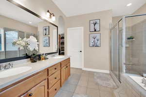 Master Bath features double vanity, separate bath and shower, jetted tub