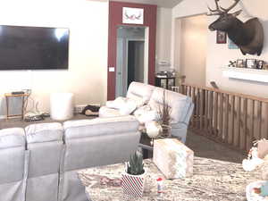 Living room featuring a textured ceiling